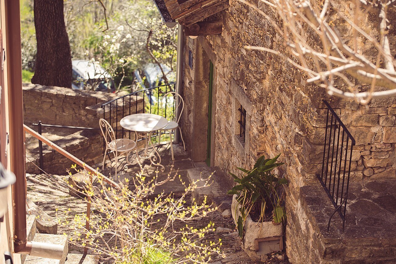 A courtyard in Motovun; not a named hotel or restaurant.